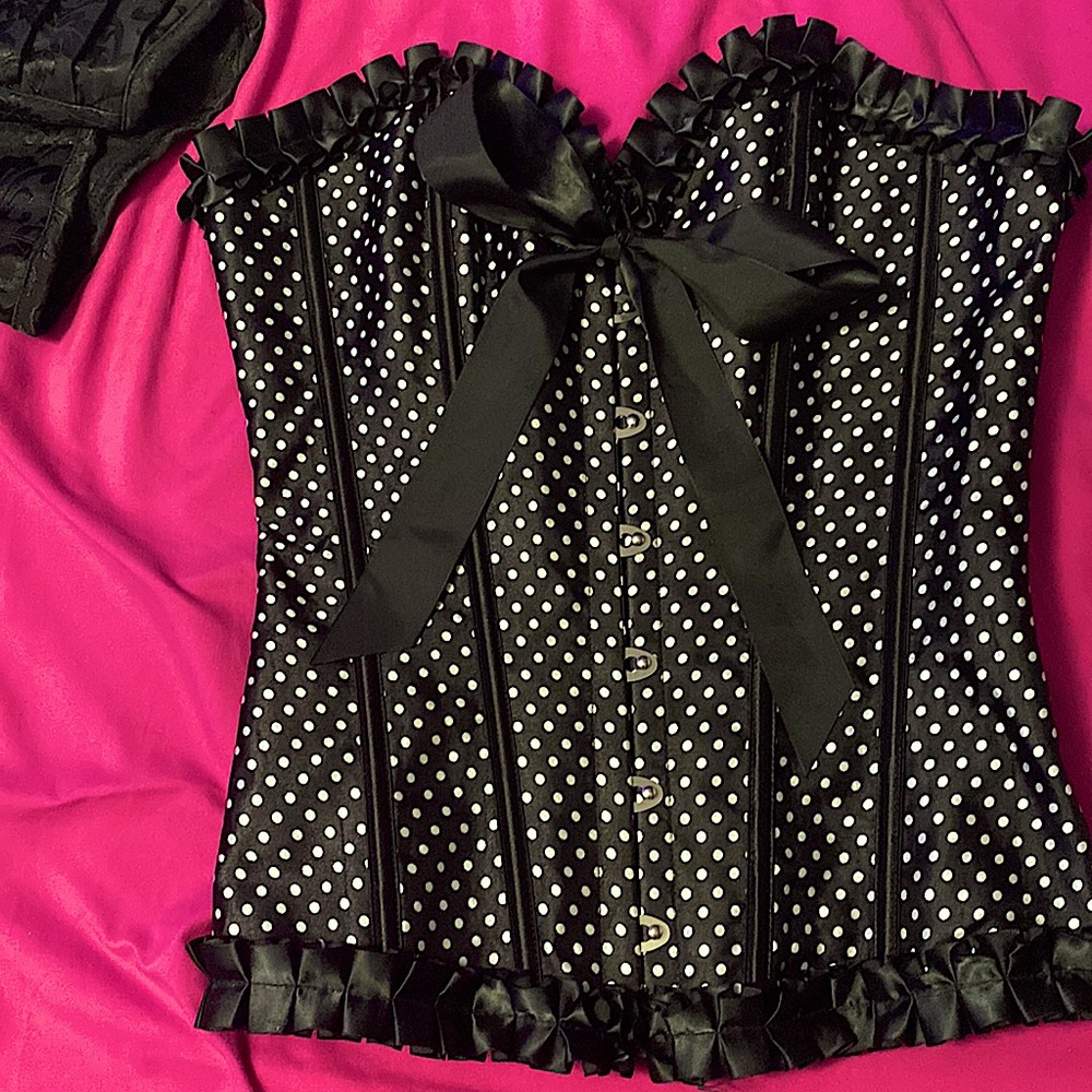 Black and white polkadot corset with bow.
